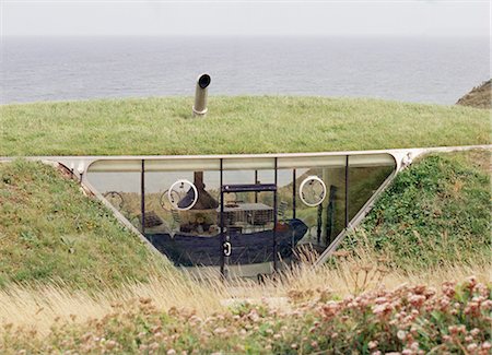 eco house - House built on sensitive sea cliff side site, underground to minimise impact, Pembroke Coast, Wales. 1998. Architect: Future Systems Stock Photo - Rights-Managed, Code: 845-02729319