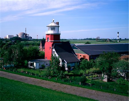 farming generation photography - Lighthouse and Nuclear power plant, Brokdorf. Stock Photo - Rights-Managed, Code: 845-03463311