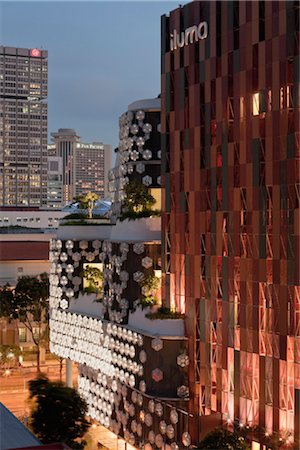 Exterior of iluma shopping and cinema complex in Singapore by WOHA Facade lighting by realities united.  Architects: WOHA Stock Photo - Rights-Managed, Code: 845-03552711