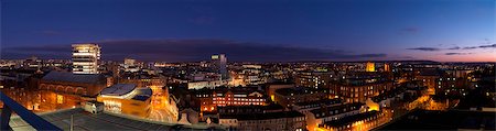 Panoramic view of the centre of Bristol at night including the new Levitt Bernstein Associates designed Colston Hall Foyer, Colston Tower, AWW architects Broad Quay Radisson Hotel, and Bristol Cathedral. Stock Photo - Rights-Managed, Code: 845-03552999