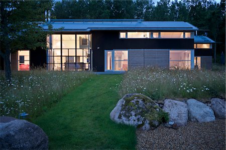 House and garden at dusk. Windows with warm light. Architects: Landstrom Arkitekter Stock Photo - Rights-Managed, Code: 845-03720877