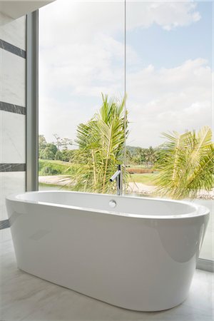 residency - Modern ceramic bathtub and glass picture windows with view. Architects: Lim Cheng Kooi and AR43 Stock Photo - Rights-Managed, Code: 845-03720880