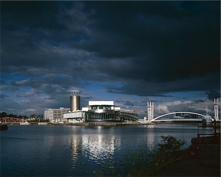 simsearch:845-05838406,k - Lowry Arts Centre, Salford Quays, Manchester. Overall exterior with dramatic sky. Architects: Michael Wilford and Partners. Engineers: Engineers: Buro Happold Stock Photo - Rights-Managed, Code: 845-03721519