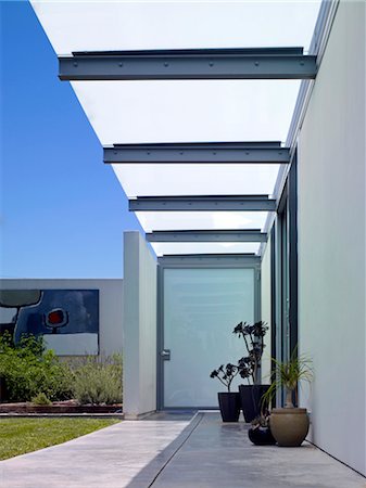 simsearch:845-06008034,k - Covered walkway, Lagatutta Residence, Los Angeles, California. Architects: SPF Architects Stock Photo - Rights-Managed, Code: 845-03777326