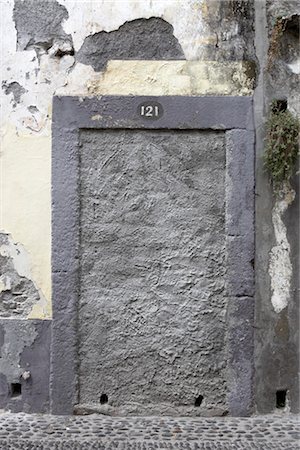 stamp (imprinted mark) - Madeira. blocked doorway with number 121 and paint peeling off wall Stock Photo - Rights-Managed, Code: 845-03777431