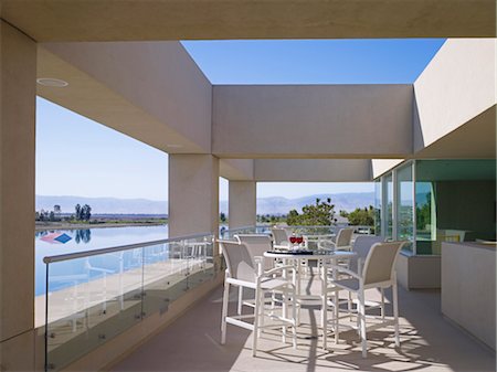 simsearch:845-06008034,k - Balcony seating outdoor dining in a modern house, California. Architects: Arthur Border Stock Photo - Rights-Managed, Code: 845-03777542