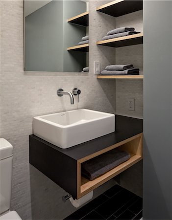 rectangled - bathroom with toilet, modern rectangular washbasin and storage shelves. Architects: WE Design - Winston Ely Stock Photo - Rights-Managed, Code: 845-03777623