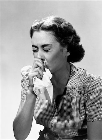 simsearch:846-05645854,k - 1950s WOMAN EYES CLOSED WITH COLD SNEEZING INTO HANDKERCHIEF Stock Photo - Rights-Managed, Code: 846-05645842