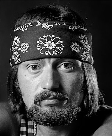 drugs (recreational) - 1970s PORTRAIT MALE WITH LONG DARK HAIR & BEARD & MUSTACHE WEARING GOLD CHAIN STRIPED TANK TOP & BANDANA AROUND HEAD Stock Photo - Rights-Managed, Code: 846-05646181