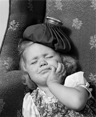 simsearch:846-05645854,k - 1940s YOUNG GIRL WITH ICE PACK ON HEAD SLEEPING Stock Photo - Rights-Managed, Code: 846-05646535
