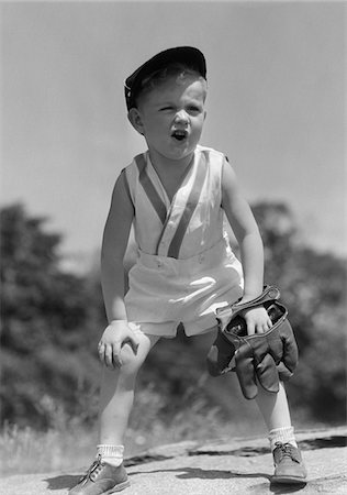 simsearch:846-02793798,k - 1930s BOY WEARING BASEBALL HAT & GLOVE BENT OVER WITH HANDS ON KNEES YELLING Stock Photo - Rights-Managed, Code: 846-05646547