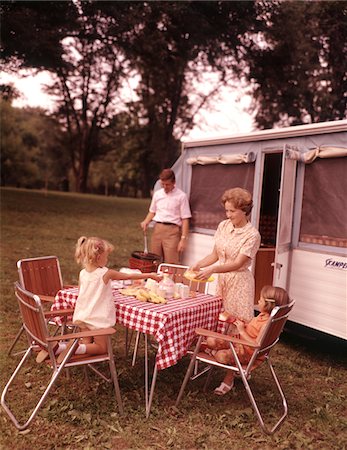 picnicking - 1960s FAMILY RV CAMPING FATHER GRILLING MOTHER  AND GIRLS SETTING TABLE Stock Photo - Rights-Managed, Code: 846-05646760