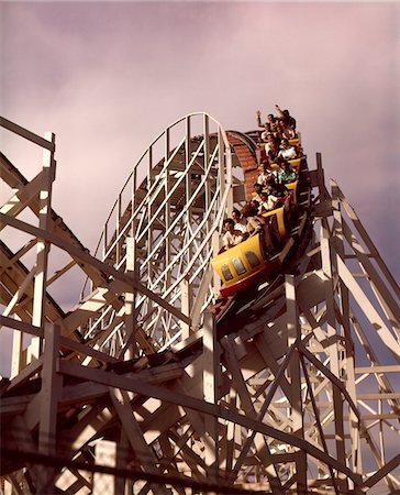 fair - 1960s PEOPLE RIDING WOODEN ROLLER COASTER DOWN WINDING TURN Stock Photo - Rights-Managed, Code: 846-05646900