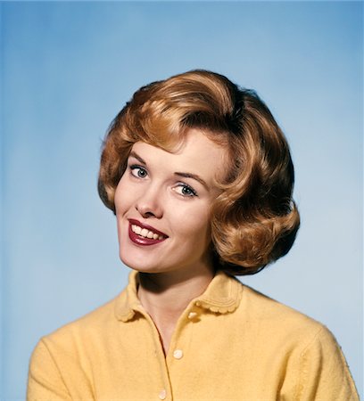 1960s SMILING BLOND WOMAN WEARING A YELLOW SWEATER HEAD TILTED QUIZZICAL EXPRESSION Stock Photo - Rights-Managed, Code: 846-05646950