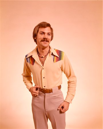 shirt collar - 1970s FASHION STYLE YOUNG MAN PORTRAIT MUSTACHE NECKLACE CASUAL CLOTHES SHIRT PANTS Foto de stock - Con derechos protegidos, Código: 846-05647294