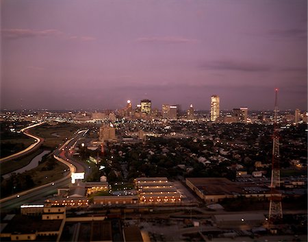 1960s TWILIGHT EVENING ELEVATED VIEW OF SKYLINE OF HOUSTON URBAN SPRAWL Stock Photo - Rights-Managed, Code: 846-05647324