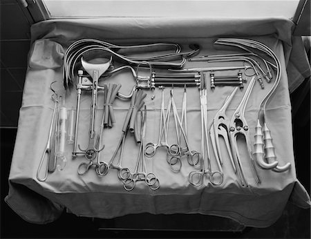 retro surgery - 1950s - 1960s TRAY DISPLAYING AN ARRAY OF MEDICAL AND SURGICAL INSTRUMENTS Stock Photo - Rights-Managed, Code: 846-05647648