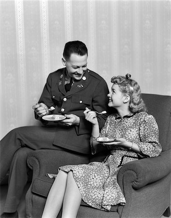 1940s SMILING COUPLE EATING DESSERT MAN IN ARMY UNIFORM Stock Photo - Rights-Managed, Code: 846-05647655