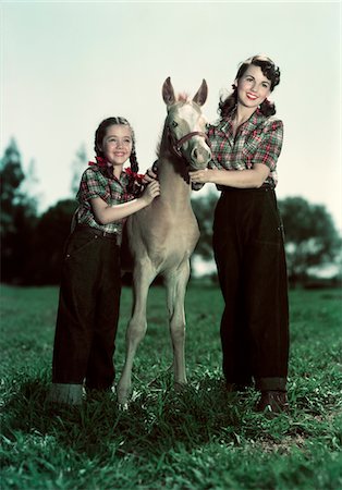 simsearch:846-02797902,k - 1940s - 1950s SMILING GIRL AND TEENAGE GIRL WEARING MATCHING PLAID SHIRTS AND JEANS POSING WITH PONY COLT Stock Photo - Rights-Managed, Code: 846-05647842