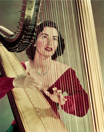 red music - 1940s - 1950s WOMAN PLAYING HARP WEARING RED VELVET GOWN Stock Photo - Rights-Managed, Code: 846-05647881