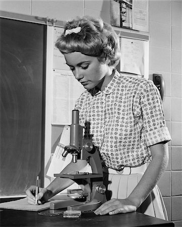 simsearch:846-02796457,k - 1960s TEEN GIRL WRITING NOTES WORKING WITH MICROSCOPE IN SCIENCE CLASSROOM Stock Photo - Rights-Managed, Code: 846-05648108