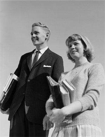 1950s - 1960s PORTRAIT TEENAGE BOY GIRL HOLDING SCHOOL BOOKS Stock Photo - Rights-Managed, Code: 846-05648131