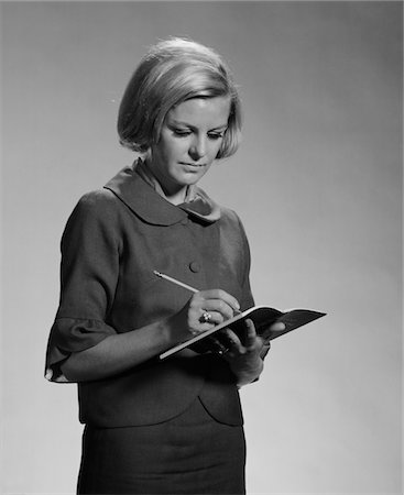simsearch:846-02796457,k - 1960s BLOND WOMAN SECRETARY TEACHER TAKING NOTES Stock Photo - Rights-Managed, Code: 846-05648259