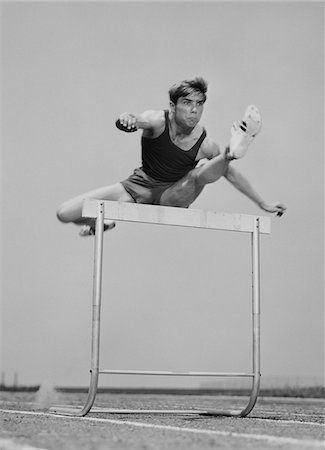 simsearch:846-02797740,k - 1960s - 1970s RUNNING MAN JUMPING OVER HURDLE Stock Photo - Rights-Managed, Code: 846-05648269