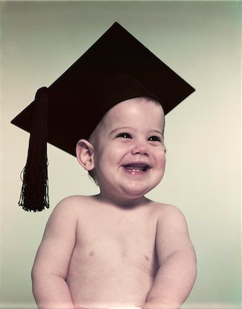 1950s SMILING BABY BOY WEARING GRADUATION CAP MORTARBOARD Stock Photo - Rights-Managed, Code: 846-06112027