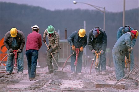 simsearch:846-05645898,k - WORKERS USING HYDRAULIC JACK HAMMERS TO REMOVE BRIDGE SURFACE Stock Photo - Rights-Managed, Code: 846-06112114