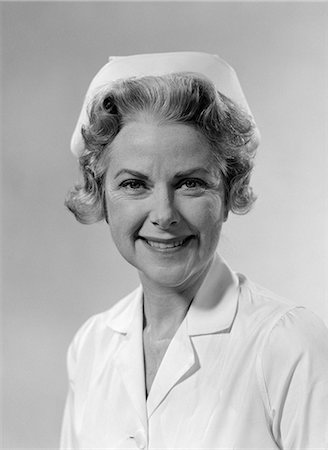 simsearch:846-05647696,k - 1960s PORTRAIT OF WOMAN NURSE SMILING WEARING WHITE CAP AND UNIFORM STUDIO INDOOR Stock Photo - Rights-Managed, Code: 846-06112213