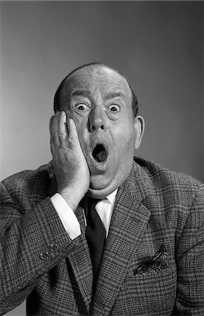 dreading - 1960s PORTRAIT OF BALDING MAN HOLDING HAND UP TO FACE WITH SHOCKED EXPRESSION EYES BULGING LOOKING AT CAMERA & MOUTH OPEN Stock Photo - Rights-Managed, Code: 846-06112281