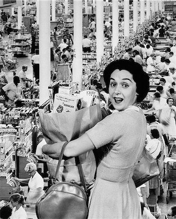 1960s HOUSEWIFE LOOKING AT CAMERA HOLDING GROCERY BAG SUPERIMPOSED OVER GROCERY STORE CHECK-OUT LINES Stock Photo - Rights-Managed, Code: 846-06112437