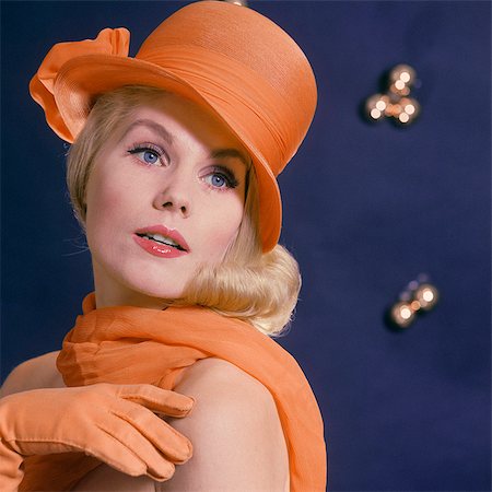 simsearch:846-07200135,k - 1960s FASHIONABLE BLOND BLUE EYED WOMAN MODEL WEARING AN ORANGE HAT WITH MATCHING SCARF AND GLOVES Stock Photo - Rights-Managed, Code: 846-08512714
