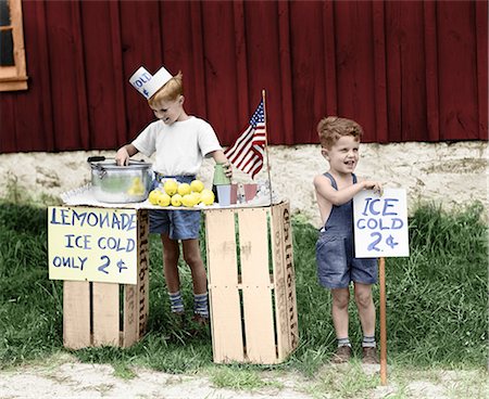 simsearch:846-05646226,k - 1940s TWO YOUNG BOYS SELLING FRESH LEMONADE AT STAND SUMMER Stock Photo - Rights-Managed, Code: 846-08512716