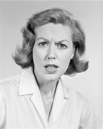 simsearch:846-08030391,k - 1950s 1960s PORTRAIT WOMAN ANGRY FACIAL EXPRESSION LOOKING AT CAMERA Stock Photo - Rights-Managed, Code: 846-08639510