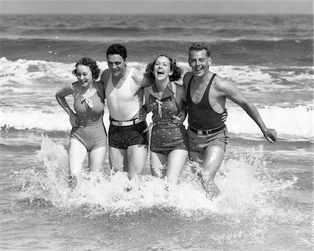 frolicking - 1930s TWO COUPLES MEN WOMEN LAUGHING RUNNING IN OCEAN SURF WAVES Stock Photo - Rights-Managed, Code: 846-09012711