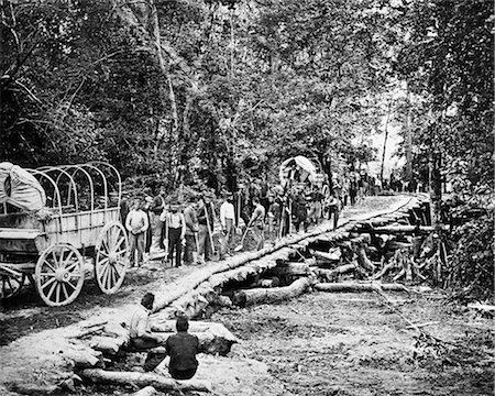 simsearch:846-05645924,k - 1860s 1864 SHERMAN'S MARCH UNION TROOPS BUILDING A CORDUROY ROAD THROUGH SOUTHERN SWAMP DURING AMERICAN CIVIL WAR Stock Photo - Rights-Managed, Code: 846-09012761