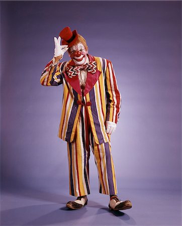 simsearch:700-01185219,k - 1970s CIRCUS CLOWN TIPPING HIS HAT WEARING STRIPED SUIT Stock Photo - Rights-Managed, Code: 846-09012870