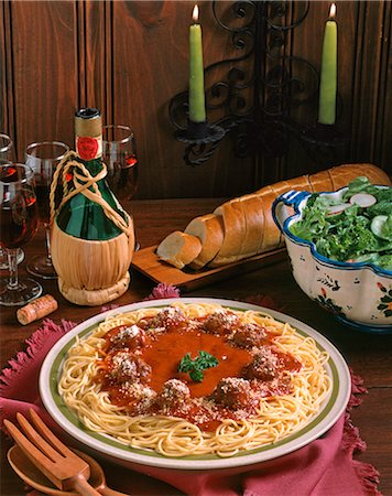 simsearch:846-03165636,k - ITALIAN MEAL SPAGHETTI AND MEATBALLS SALAD BREAD AND WINE Stock Photo - Rights-Managed, Code: 846-09012881