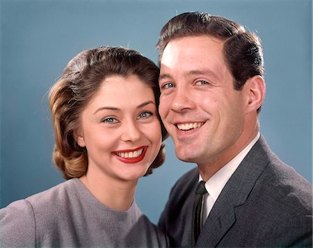 simsearch:846-05648202,k - 1960s PORTRAIT SMILING HAPPY COUPLE MAN WOMAN PORTRAIT HUSBAND AND WIFE HEAD TO HEAD LOOKING AT CAMERA Stock Photo - Rights-Managed, Code: 846-09012984