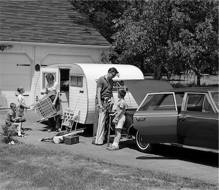 simsearch:846-09012864,k - 1960s FAMILY OF 5 LOADING LAWN CHAIRS & SPORTS EQUIPMENT INTO CAR & TRAILER Stock Photo - Rights-Managed, Code: 846-09013075