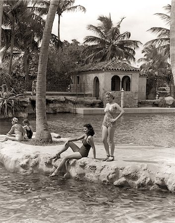 south east - 1930s 1940s 2 WOMEN BATHING SUITS SANDALS BY EDGE OF VENETIAN POOL CORAL GABLES FLORIDA Stock Photo - Rights-Managed, Code: 846-09013109