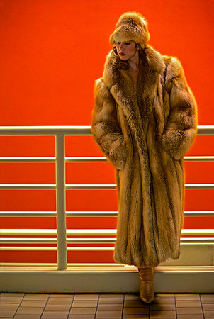 1980s WOMAN MODEL IN FUR COAT AND HAT STANDING BY WHITE RAILING Stock Photo - Rights-Managed, Code: 846-09181460