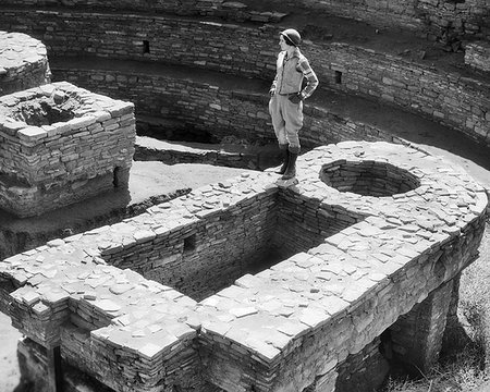 female native american clothing - 1930s WOMAN STANDING ON LARGE KIVA CHACO CANYON PUEBLO RUINS NEW MEXICO USA Stock Photo - Rights-Managed, Code: 846-09181510