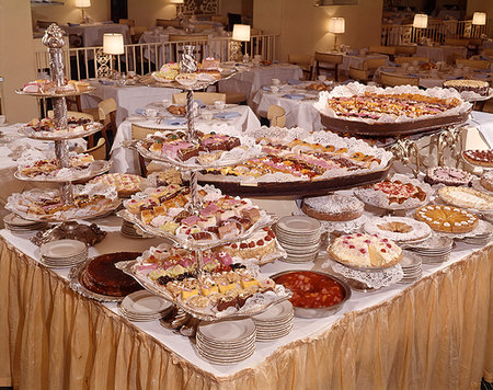 simsearch:846-02794589,k - 1960s STILL LIFE OF BUFFET DESSERT TABLE SWEET COURSE VARIOUS CAKES AND PASTRIES Stock Photo - Rights-Managed, Code: 846-09181786