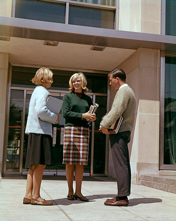 plaid skirt - 1960s THREE COLLEGE STUDENTS TALKING HOLDING TEXTBOOKS Stock Photo - Rights-Managed, Code: 846-09181883