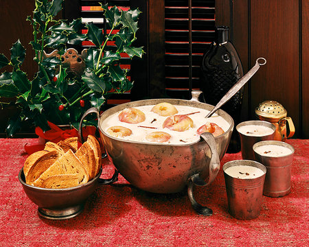 favorite - 1950s 1960s AMERICAN VERSION OF TRADITIONAL ENGLISH CHRISTMAS TIDE BOWL OF WASSAIL PUNCH WITH APPLES AND SLICES OF TOAST AS SOPS Stock Photo - Rights-Managed, Code: 846-09181908