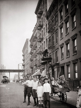 retro usa - 1900s 1913 LOWER EAST SIDE MANHATTAN TENEMENT KIDS LOOKING AT CAMERA STANDING BY A BROOM AND BRUSH PUSH CART NEW YORK CITY USA Stock Photo - Rights-Managed, Code: 846-09181963