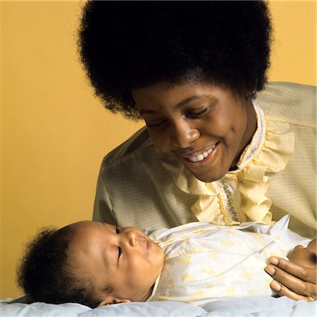 1960s 1970s SMILING AFRICAN AMERICAN MOTHER WITH INFANT BABY Stock Photo - Rights-Managed, Code: 846-02794080